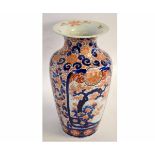 Large 19th century Imari decorated vase with flared neck with typical rust and blue floral