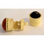 Ivory or bone basket formed pin cushion together with a further bench mounted pin cushion with screw