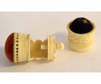 Ivory or bone basket formed pin cushion together with a further bench mounted pin cushion with screw