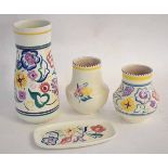 Group of Poole pottery wares including three baluster vases, 23cms, 13cms and 13cms, all floral