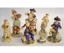 Six Continental porcelain figurines and a small bud vase