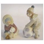 Lladro figure of an Eskimo girl with bear together with a model of a young girl dressed as a