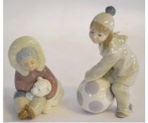 Lladro figure of an Eskimo girl with bear together with a model of a young girl dressed as a