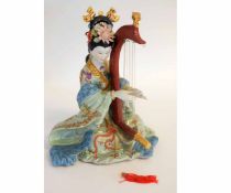 Chinese model of a lady playing a harp, 30cms high