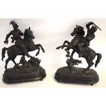 Two models of Conquistadors on horseback on raised bases, 40cms high