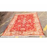 Modern Ziegler carpet with rust ground with cream floral design, 195cms wide x 290cms long