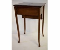 Edwardian mahogany and inlaid desk with two opening flaps to top enclosing a leather panel and a