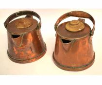 Pair of early 20th century copper jugs with swing handles and wooden lids, stamped "Bulpitt & Sons