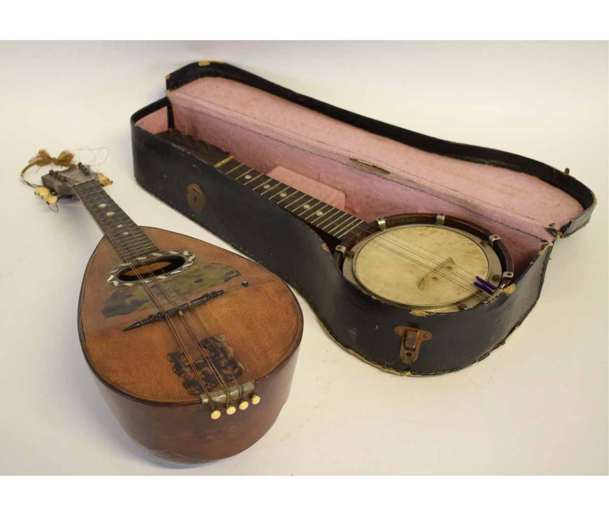 19th century mandolin by Michele Maratea, with inset mother of pearl and tortoiseshell detail,