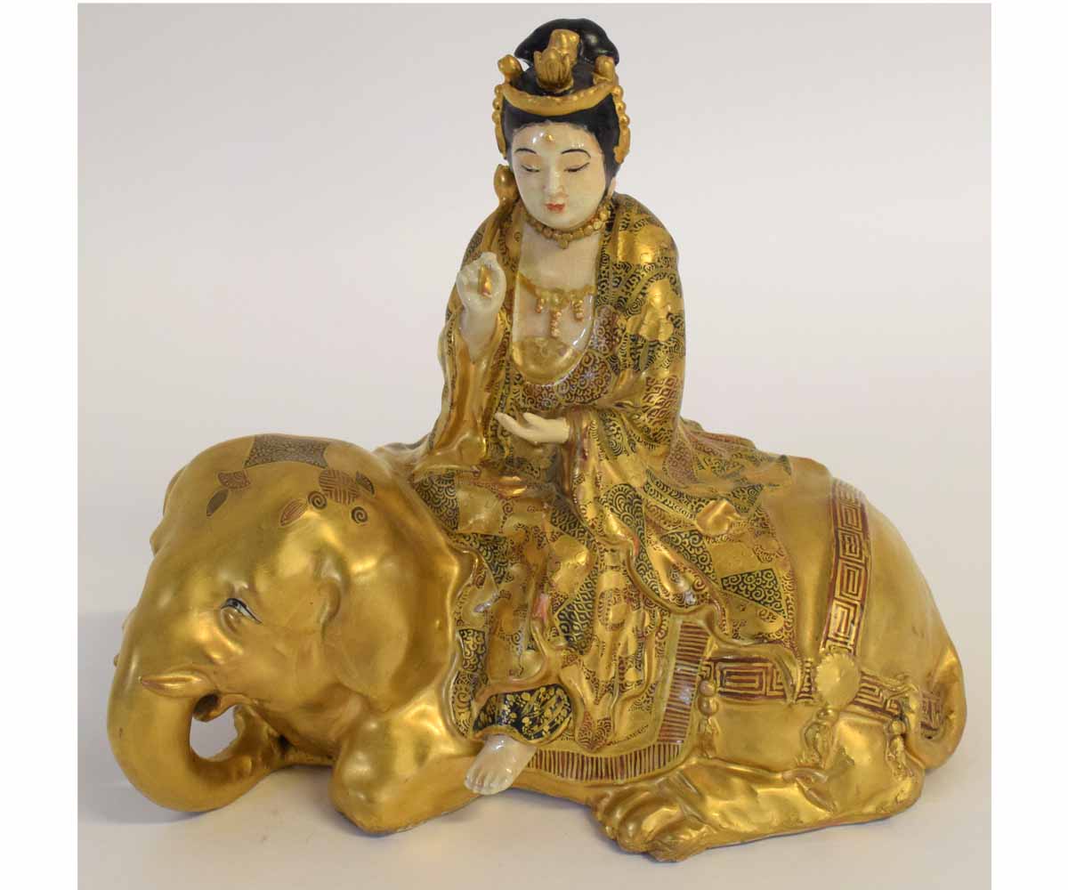 Satsuma model of a lady seated astride a kneeling elephant, signature to base, 20cms