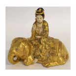 Satsuma model of a lady seated astride a kneeling elephant, signature to base, 20cms