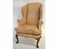 Pair of 18th century style wing back armchairs with pink upholstery and shaped beechwood front legs