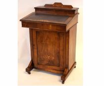 Victorian walnut Davenport with inlaid detail and brown leather inserts, raised on porcelain