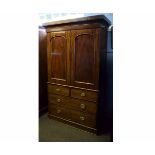 Victorian mahogany linen press fitted with two arched cupboard doors and pull-out slides, the base