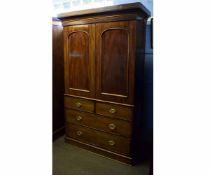 Victorian mahogany linen press fitted with two arched cupboard doors and pull-out slides, the base