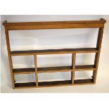 Early 19th century oak wall mounted plate rack with three fixed shelves, 124cms wide x 98cms tall