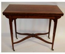 Edwardian walnut fold-over card table with inlaid stringing and green baize fitted interior,