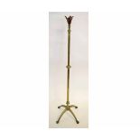 Arts & Crafts brass adjustable standard lamp with shaped copper leaves to mount on a shaped