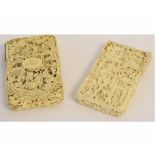 Two ivory card cases with typical carved decoration 9 1/2cm long
