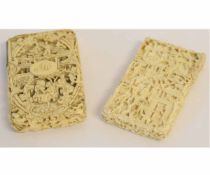 Two ivory card cases with typical carved decoration 9 1/2cm long