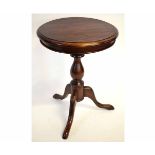 Good quality mahogany circular top wine table with turned column on a tripod base, 50cms wide x