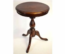 Good quality mahogany circular top wine table with turned column on a tripod base, 50cms wide x