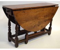 18th century oak drop leaf gate leg table on turned supports, 108cms wide x 68cms tall