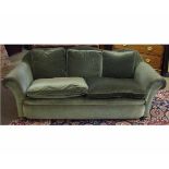19th century green Dralon upholstered three-seater sofa with shaped back, raised on bun front