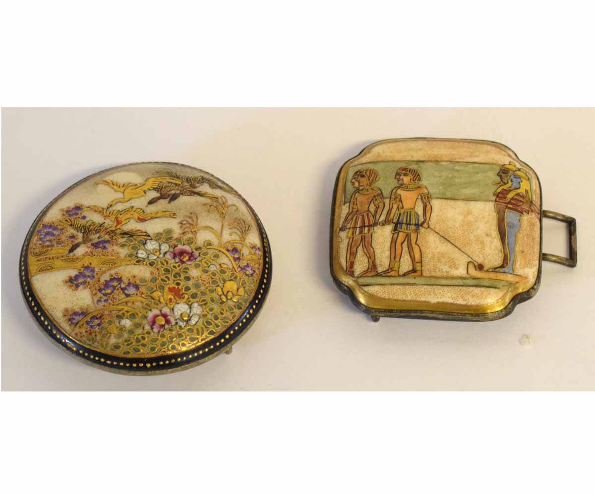 Two Satsuma buckles, one with and Oriental design and the other with Egyptian figures, the largest