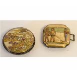 Two Satsuma buckles, one with and Oriental design and the other with Egyptian figures, the largest