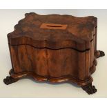 Late 19th century walnut converted money box with inlay, the serpentine shape raised on four paw