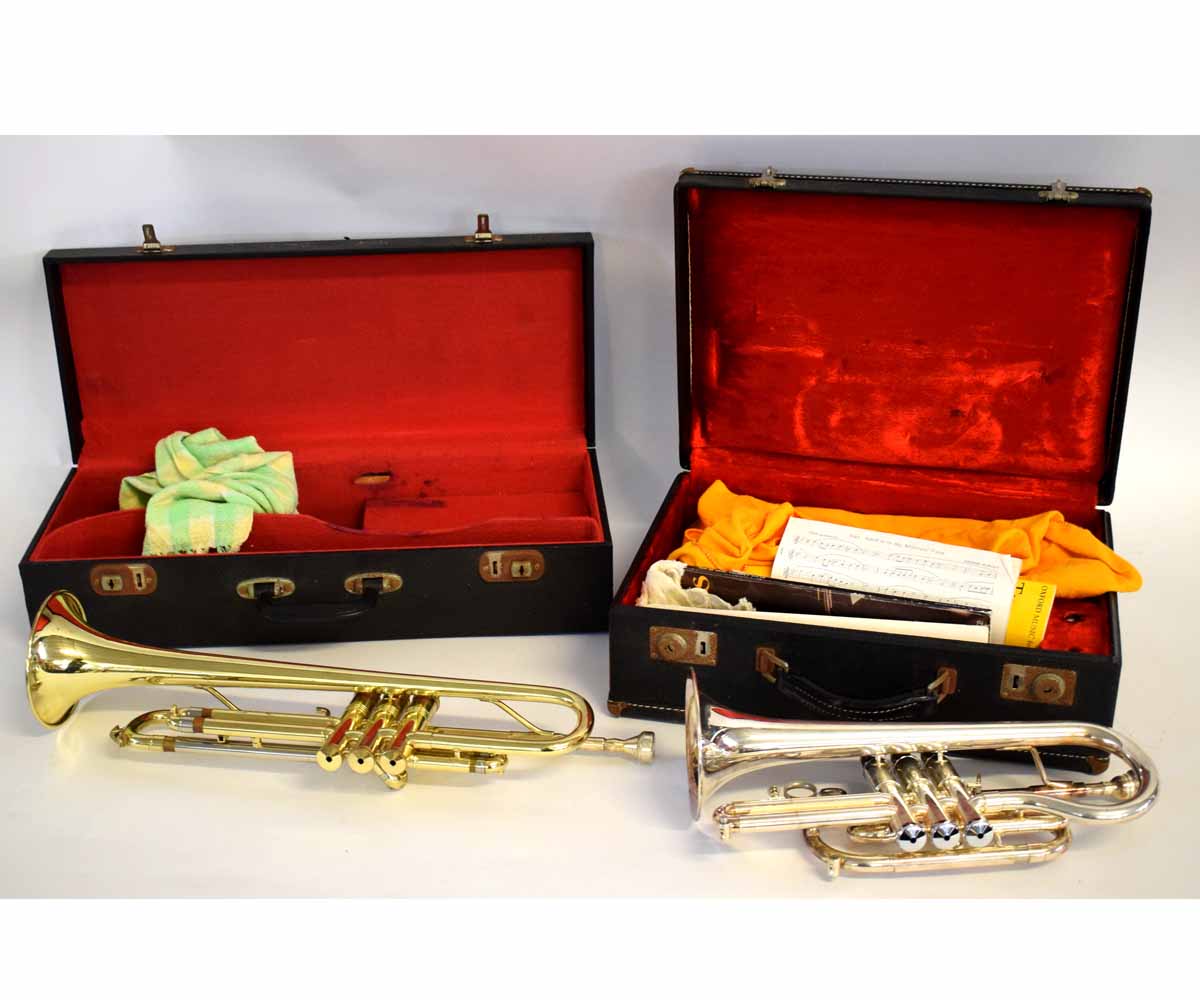 Cased Capri by Getzen chrome plated clarinet, together with a further cased Lincoln brass trumpet (