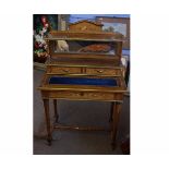 Good quality French kingwood bonheur-de-jour with inlaid detail and mirrored back, the top fitted