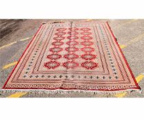 Modern Bokhara type carpet with cream and red field, with repeating lozenge centre with multi-gulled