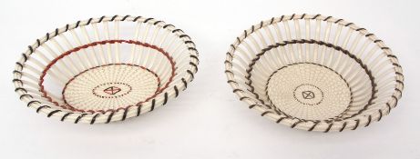 Pair of late 19th century Wedgwood creamware baskets with pierced fretwork and interspersed with a