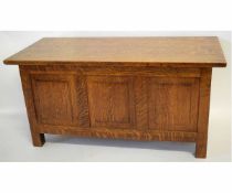 Early 20th century oak framed small proportioned coffer with three panelled front with inscription