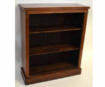 Victorian mahogany framed dwarf bookcase with open front and adjustable shelves and panelled back,