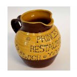 Pottery jug in brown and buff body entitled "Princess Restaurant, Norwich", together with a