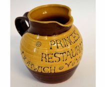 Pottery jug in brown and buff body entitled "Princess Restaurant, Norwich", together with a