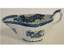 18th century English porcelain sauceboat possibly Isleworth, the exterior with blue printed na ve