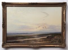 AR COLIN W BURNS (born 1944) Curlew over Breydon Water oil on canvas, signed lower left 50 x 75cms