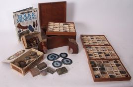 Early 20th century wooden box with four trays of minerals and rock samples, together with a