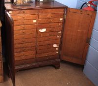 Early 20th century 23-drawer collector's/specimen cabinet with two folding doors, one single