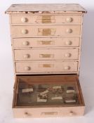 Early 20th century pine six-drawer collector's/specimen cabinet, the six drawers with glazed tops