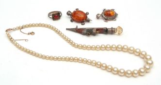 Mixed Lot: hallmarked silver Scottish dirk brooch (a/f), two white metal and amber brooches, an