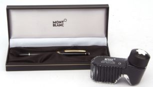Late 20th century Mont Blanc black and gilt fountain pen, the nib marked "4810, 14K, 585" and with