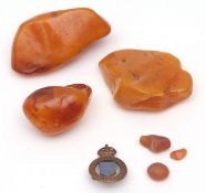 Group of three polished amber pieces, 114gms gross wt