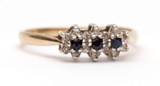 Modern 9ct gold diamond and sapphire cluster ring, a design of three small joined stars, each with a