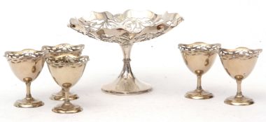 Late Victorian footed bowl of shaped circular form with pierced gallery, on a spreading circular