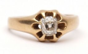 Mid-grade yellow metal single stone diamond ring, the cushion cut diamond 0.30ct approx, raised in a